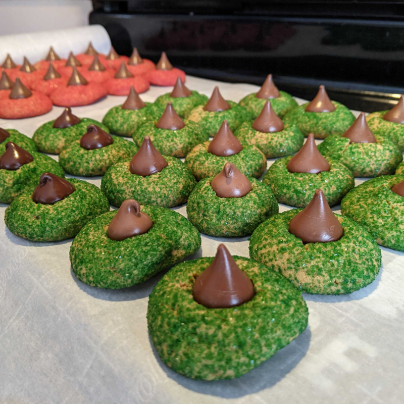 Hidden Talents - Rows of Green and Red Cookies With Chocolate Pieces on Top