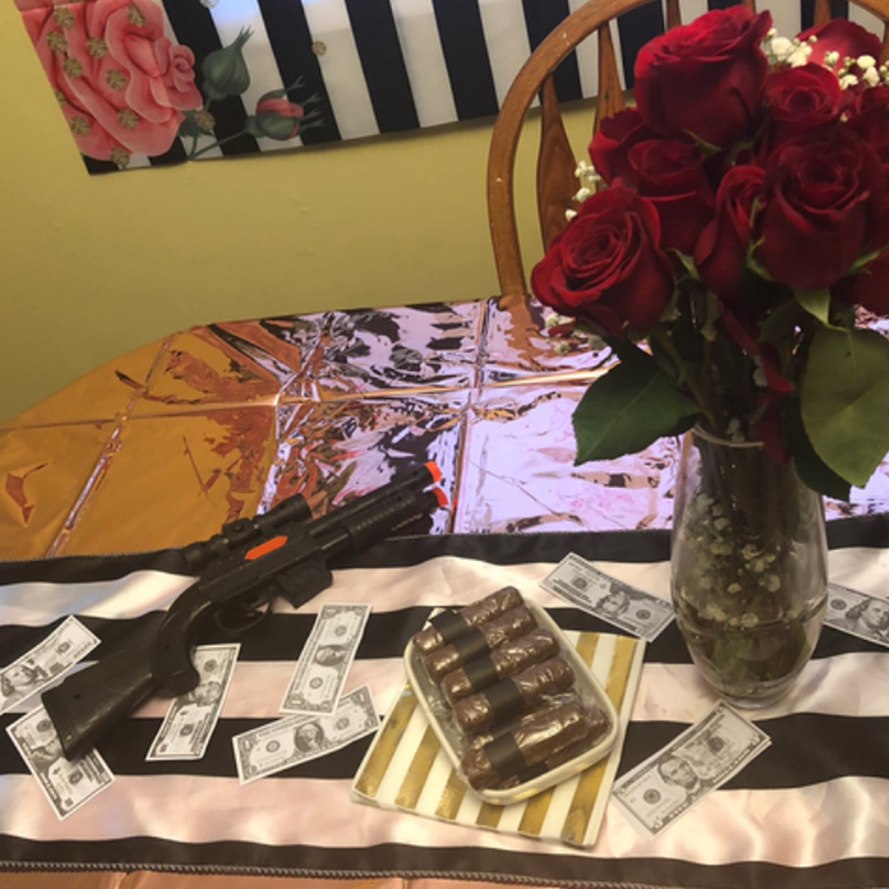 Hidden Talents - Toy Gun, Money, Fake Cigars, and Roses on Table