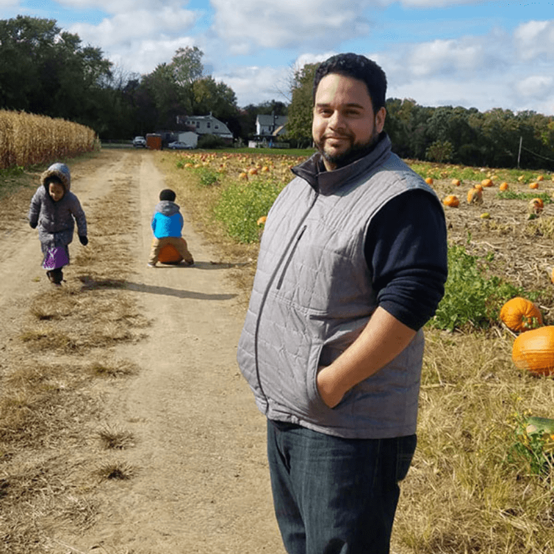 Favorite Things About Fall - Eric and His Children in a Pumpkin Patch
